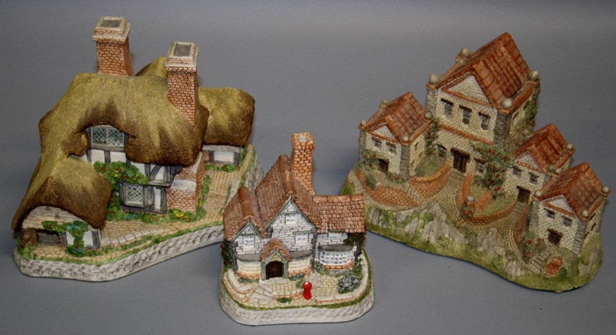 A David Winter cottage, 'Moonlight Haven', together with 'Alms Houses' and ten smaller David