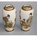 A pair of early 20th century Japanese Satsuma vases of ovoid form, each decorated with Geisha in