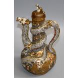 An early 20th century Japanese Satsuma ewer and cover with kylin finial, entwined dragon handle