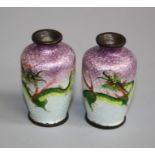A pair of miniature Japanese cloisonné vases, each decorated with a three claw dragon on a shaded