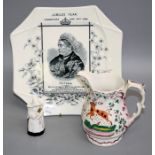A Royal Worcester candle snuffer modelled as a nun, black printed mark, A Victorian pink lustre stag