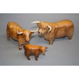 A Beswick Highland bull, number 2008, a Highland cow, number 1740 and a Highland calf, number