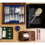 A collection of silver items including salt brushes, teaspoons, in case, plated flatwares