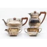 An Art Deco silver matched four tea service, comprising teapot, water jug, milk jug and sugar