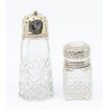 An Edwardian hob nail cut glass toilet bottle and stopper with silver cover, the silver by