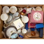 A collection of china items, boxed and unboxed, including commemorative mugs, glass bells, Caithness