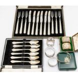 A collection of silver to include: George VI silver handled case of six fruit knives and forms,9;.