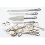 A group of silver flatware to include: two Irish silver dessert spoons, Dublin 1818 and 1841, both