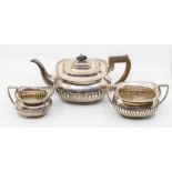 A late Victorian three piece silver tea service, Georgian style comprising teapot, sugar bowl and