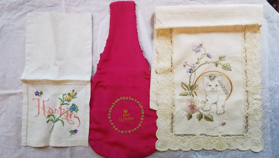 ***OBJECT LOCATION BISHTON HALL*** A small linen handkerchief case with handkerchiefs, embroidered