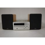 A Denon Cd Player + Speakers X2  No Power Supply Provided