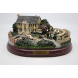 A Hawthorne Village Model Of Graceland  Sculpture Light Up   2002 edition Number B7154  Good Overall