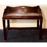 A traditional mahogany butlers tray top coffee table on stand, width 73cm