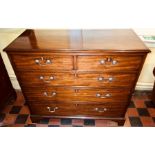 A George III flame mahogany crossbanded chest of drawers, circa 1800, in rectangular form moulded