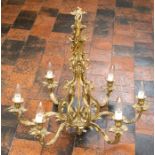 A gilt metal pendant six light electrolier, 20th Century, of Rococo design, the drop approximately