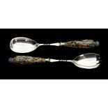 A pair of late Victorian silver salad servers, Royal Doulton stoneware sgraffito handles,