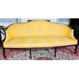 A Regency mahogany and later damask upholstered sofa, circa 1800, serpentine shape top with