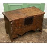A James I oak plank chest of small proportions, iron hinges, chip carved edges, lock, shaped frieze,