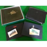 Motoring Interest, a Rolls Royce commemorative package in in black Connelly slip case, to mark