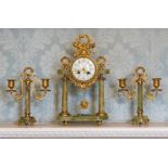 A French clock garniture, 20th Century, of Baroque design in green onyx with cast gilt metal