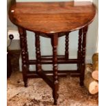 A George II oak dropleaf table of small proportions, circa 1740, oval flaps, bobbin turned legs,
