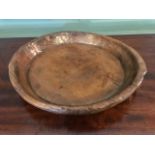 Treen, a large decorative rustic wooden bowl, flat bed and shallow sides, diameter 47cm