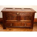 A Charles II oak mule chest, circa 1670, three moulded panel lid, metal lock, two moulded panel