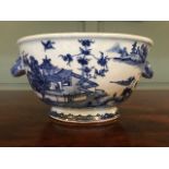 A late 18th/early 19th Century Chinese blue and white soup tureen, of bombe form, beast twin