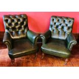 A pair of Victorian oak framed gentleman's library armchairs, circa 1870, green button back