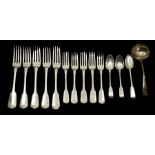 A composite suite of Georgian and Victorian silver flatware, mainly fiddle pattern, all with shell