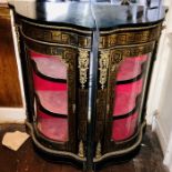 A pair of Victorian ebonised corner credenzas, serpentine shape slight oversailing top, gilt metal