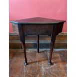 A traditional dark oak corner occasional table, on pad feet, (adapted using old timber), width
