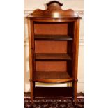 An Edwardian mahogany bowfront vitrine, circa 1905, florally inlaid pediment, single door, tapered