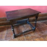 A Charles II peg joined oak side table, circa 1670, plank top, baluster supports, stretcher, block