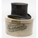 An Edwardian lady's black silk Pro Patria dressage or side saddle top hat, in a cardboard