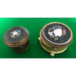 Derbyshire Ashford Marble - a 19th century gilt metal circular box and cover, raised on ball feet,