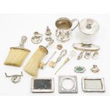 Assorted silver, to include a George V baluster mug, Sheffield 1934, dressing table silver, two