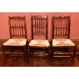 A set of six 19th Century ash 'Liverpool' fan back rush seated dining chairs, circa 1820, carved fan