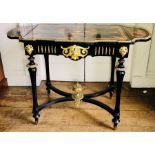 A French 19th Century Louis Philippe ebonised and marquetry inlaid side or writing table, with