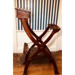 A Victorian mahogany collatable and portable auctioneer's rostrum, standing on an X shape frame