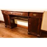 An early Victorian rosewood breakfront twin pedestal sideboard, circa 1840, shaped slight