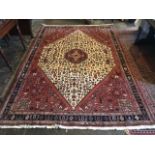 An Iranian Qashkuli carpet, 20th Century, kurk wool/cotton, stylized motifs including stags,