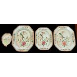 A graduated set of three Chinese porcelain octagonal platters, Qianlong period, painted in the