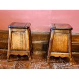 A pair of European wooden stools, early 20th Century, sliding covers to the tops opening to