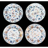 A set of four Chinese plates, Qianlong, painted in the imari palette with trailing foliage, diameter