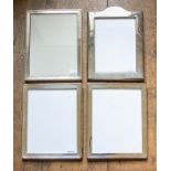 A near pair of George V rectangular silver framed easel photograph frames, openings 22cm by 17cm,