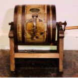 A coopered oak butter churn, with plaque inscribed 'Prize Awarded by Royal Agricultural Society of