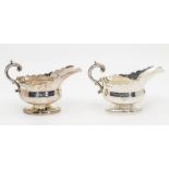 A pair of early Victorian silver bombe sauce boats, scalloped edges, double C scroll handles,