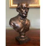 A 19th Century bronzed copper bust of William Ewart Gladstone, circular socle, square plinth, height