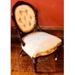 A mid Victorian walnut spoon back parlour chair, circa 1850, foliage carved frame, champagne